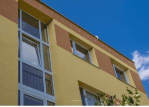 Yellow pre-fab apartment housing